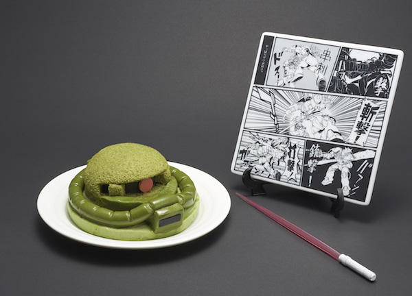 Kue Gundam Zaku hadir dengan piring khusus dan Beam Saber